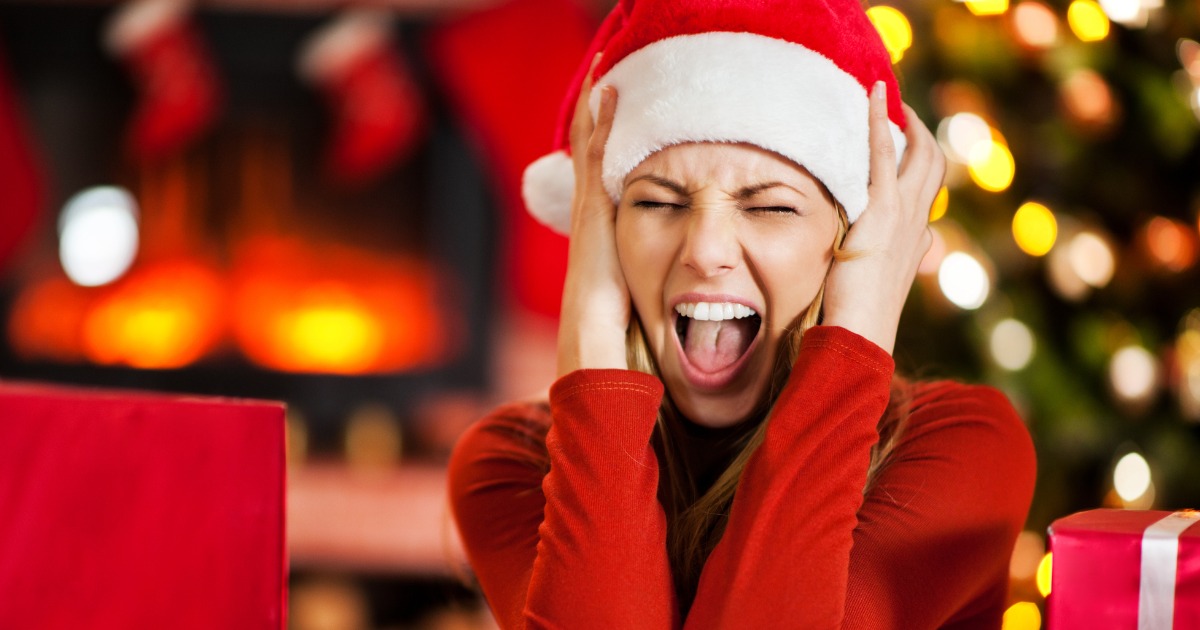 Woman Wearing Santa Hat Screaming