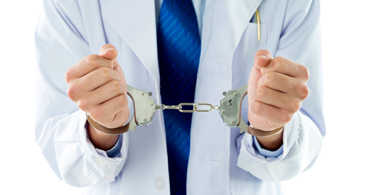 Close Up of Doctor in Handcuffs