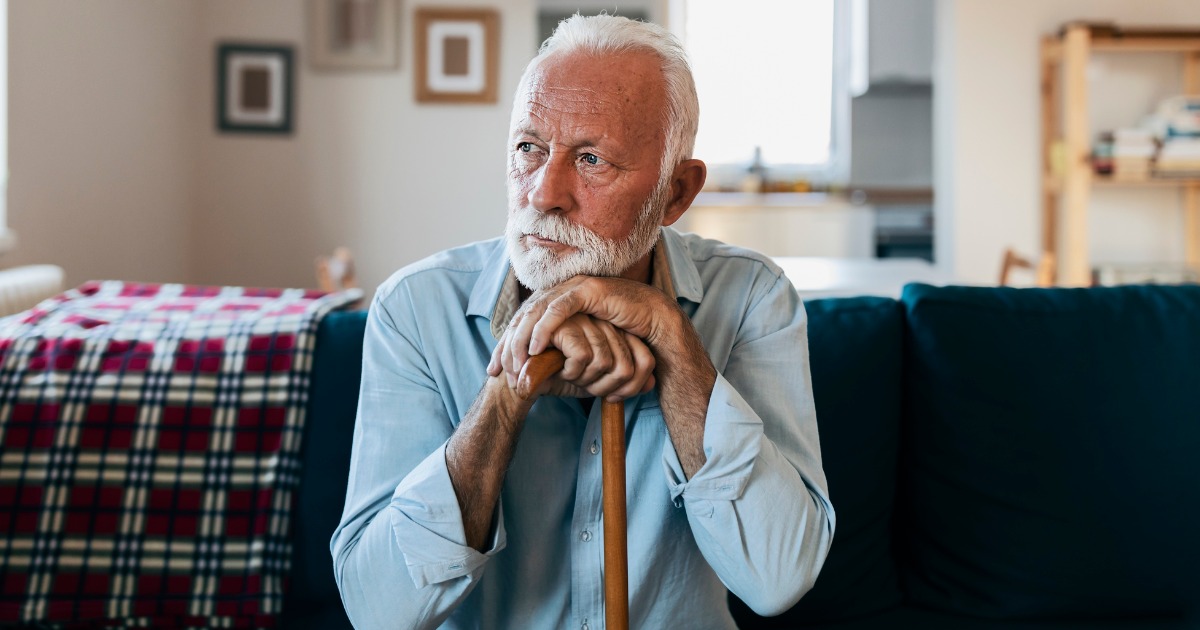 Elderly Man Sitting Alone Looking Pensive